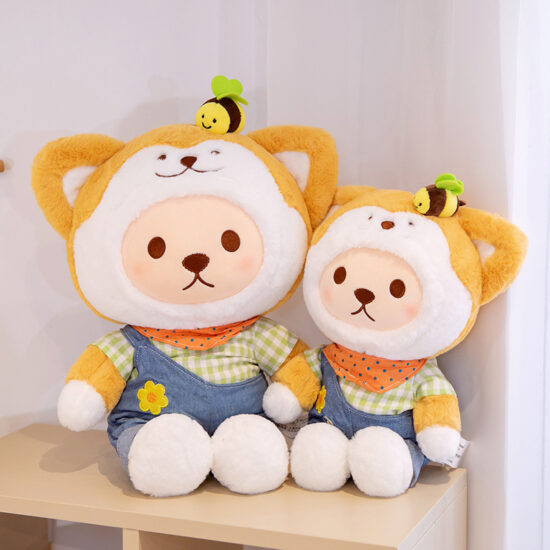 Akita dog plush toy in plaid overalls lying down with cute teddy features
