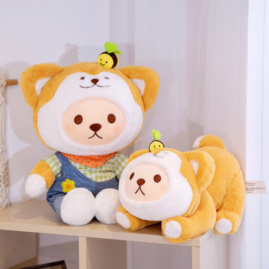 Akita dog plush toy in plaid overalls lying down with cute teddy features