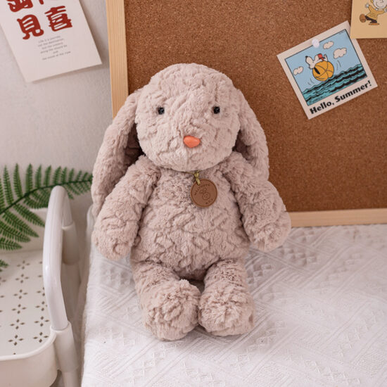 Cute plush bunny toy with floppy ears and a sweet expression, perfect gift for kids or Valentine's Day