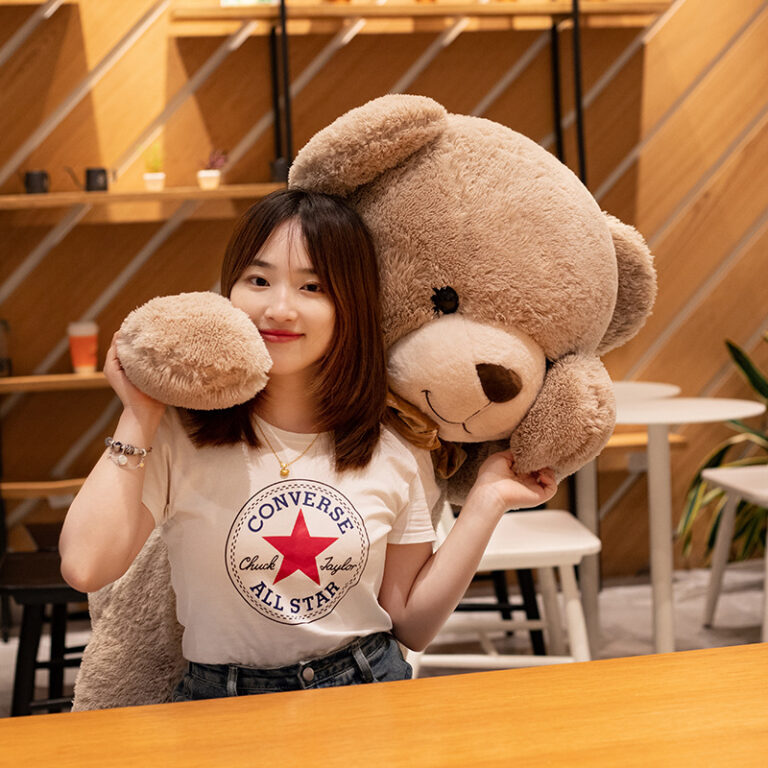 Giant plush teddy bear and panda hugging pillow – soft stuffed toy for bed, sleep, and gifts.