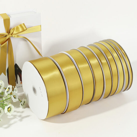 Gold satin ribbon for DIY crafts, gift wrapping, floral bouquets, and hair bows