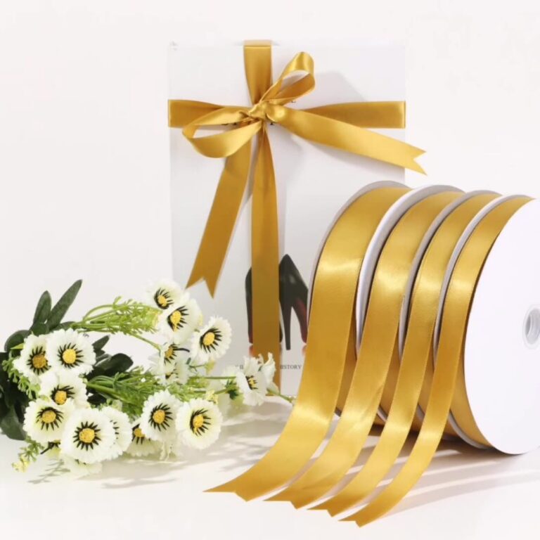 Gold satin ribbon for DIY crafts, gift wrapping, floral bouquets, and hair bows