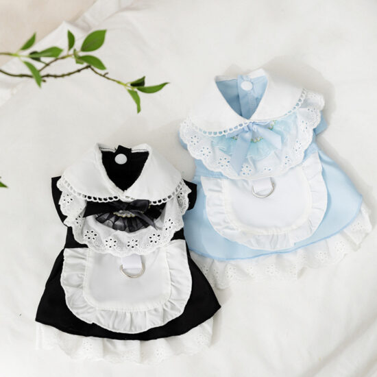 Small dog wearing maid-style pet lace dress with leash attachment