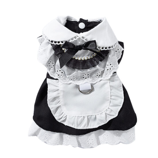 Small dog wearing maid-style pet lace dress with leash attachment
