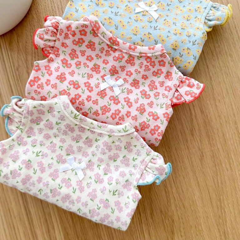 Small dog wearing summer lightweight pet clothes