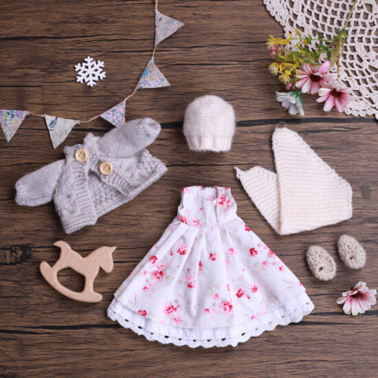Handmade Waldorf cloth doll with custom dress-up outfits for girls