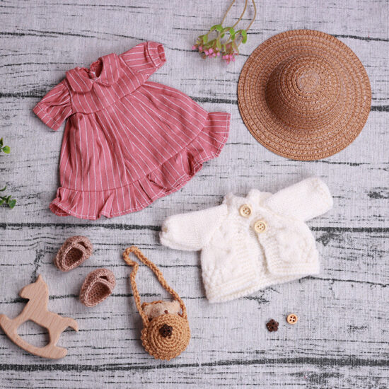 Handmade Waldorf cloth doll with custom dress-up outfits for girls