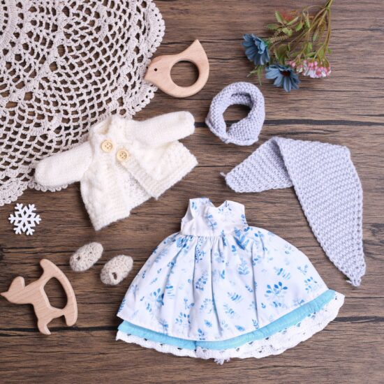 Handmade Waldorf cloth doll with custom dress-up outfits for girls